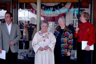 Our founder, in white, Marlene Schmalbeck flanked by our museum building donor Ruth Knight-Sybers.